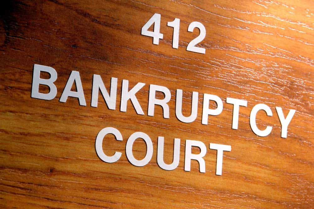 Wooden surface with the wording "412 Bankruptcy Court"