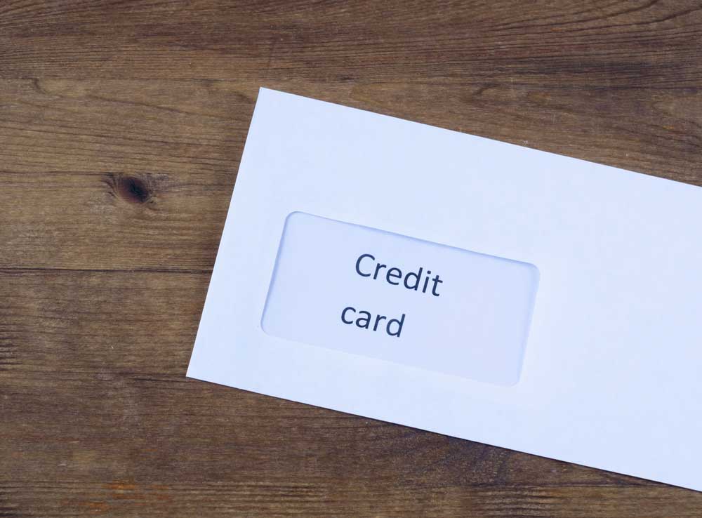 White envelope with the text "Credit card"