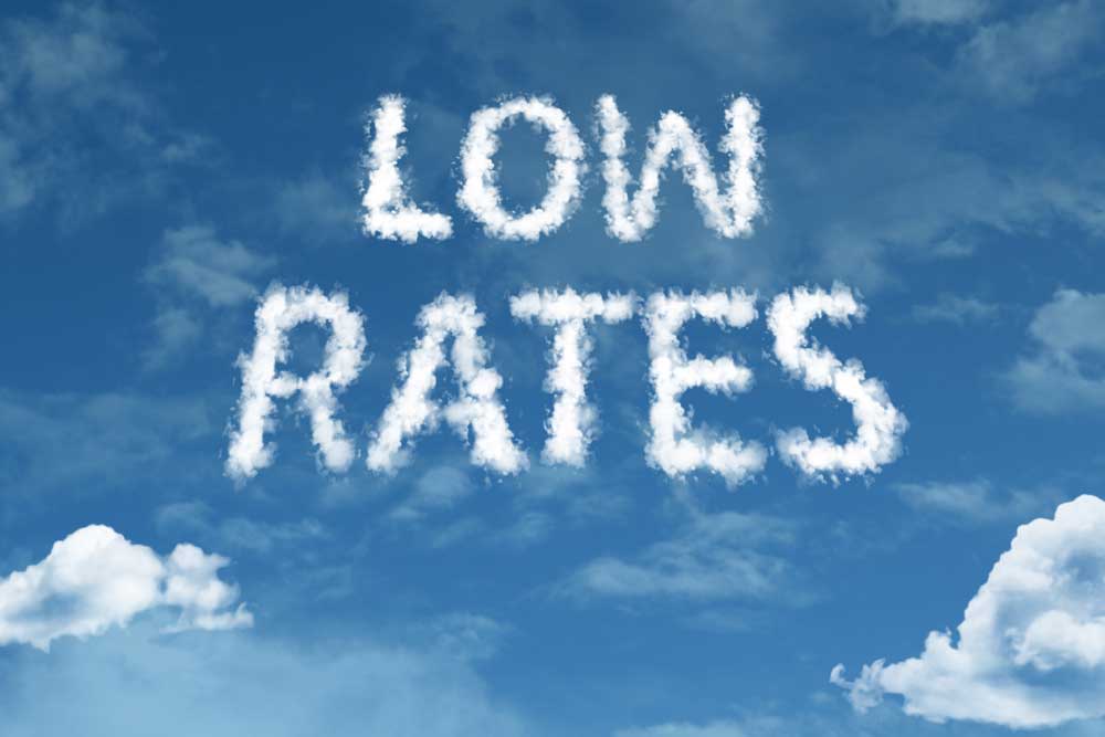 Blue sky with the words "Low rates" written with white clouds