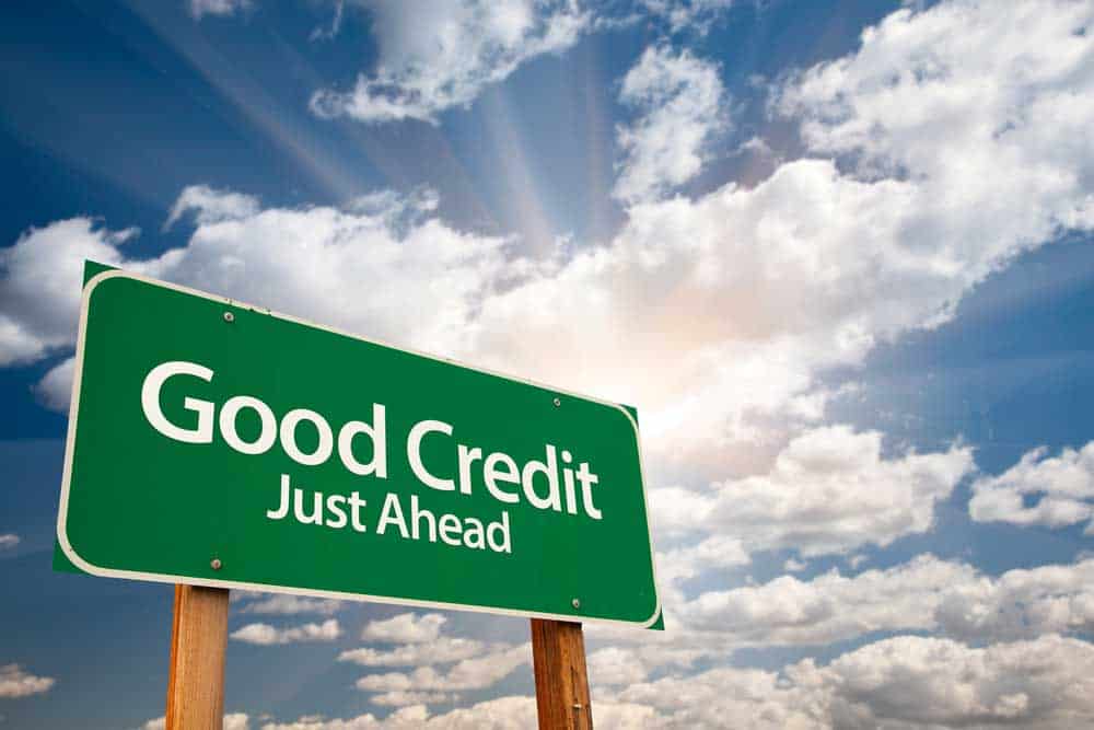 Big green sign with the text "Good Credit - Just Ahead"