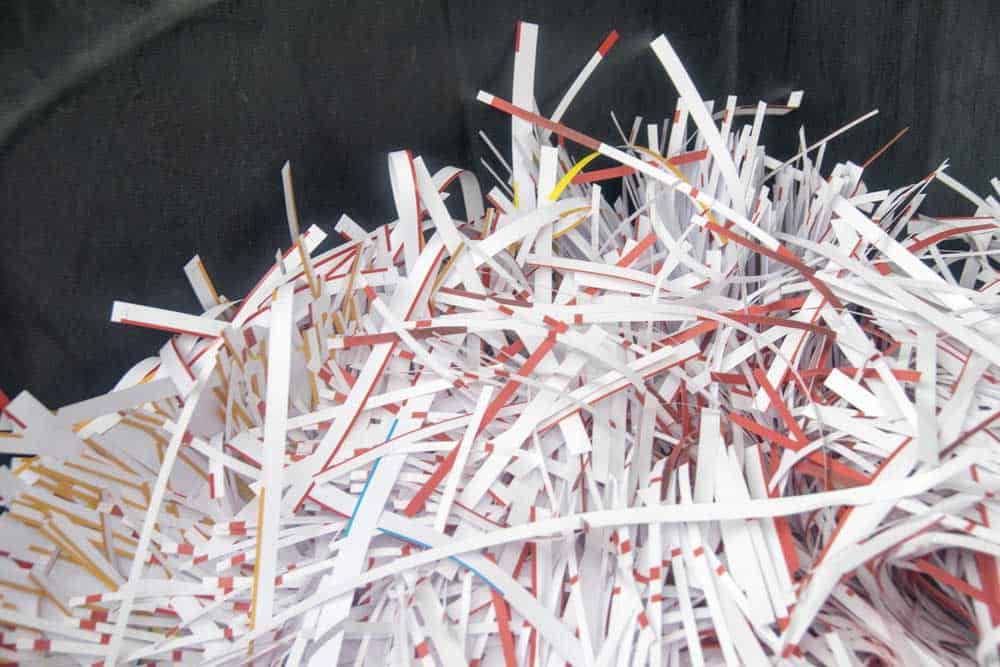 A pile of scredded documents (paper).